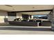 Covered outdoor patio with comfortable seating and a barbecue grill at 20370 E 52Nd Ave, Denver, CO 80249