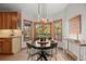 Charming breakfast nook with views, perfect for enjoying meals with Gathering and friends at 7192 Pinewood Dr, Evergreen, CO 80439