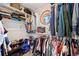 Walk-in closet with shelves and hanging storage at 7192 Pinewood Dr, Evergreen, CO 80439