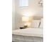 Cozy bedroom featuring neutral colors and bright natural lighting at 8503 Estes Park Ave, Littleton, CO 80125