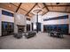 Spacious clubhouse with a soaring ceiling, stone fireplace, and plenty of room to socialize at 8503 Estes Park Ave, Littleton, CO 80125