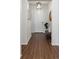 Bright entryway with hardwood floors and stylish decor at 8503 Estes Park Ave, Littleton, CO 80125