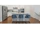 Kitchen with granite countertops and stainless steel appliances at 8503 Estes Park Ave, Littleton, CO 80125