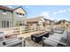 Inviting patio area with a fire pit and comfortable seating, perfect for outdoor entertaining at 8503 Estes Park Ave, Littleton, CO 80125