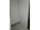 Walk-in closet with built-in bench, providing ample storage and organization at 6034 Keyser Pl, Brighton, CO 80601