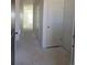 Hallway with doors awaiting finishing, showcasing potential for customization at 6034 Keyser Pl, Brighton, CO 80601