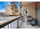 Cozy balcony area featuring a grill with views of the complex and surrounding trees at 720 Columbine Rd # B, Breckenridge, CO 80424