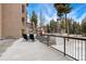 Large, covered balcony area with multiple seating options and stunning mountain views at 720 Columbine Rd # B, Breckenridge, CO 80424