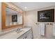 Well-lit bathroom features a spacious vanity with a large mirror and ample storage, creating a functional space at 720 Columbine Rd # B, Breckenridge, CO 80424