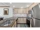 Modern kitchen with stainless steel appliances and stylish backsplash, perfect for cooking at 720 Columbine Rd # B, Breckenridge, CO 80424