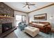 Bright living room with stone fireplace and balcony access, perfect for relaxation at 720 Columbine Rd # B, Breckenridge, CO 80424