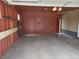 Attached garage with storage and additional door at 209 Reed St, Lakewood, CO 80226