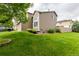 Spacious backyard with lush green lawn and garden beds, perfect for outdoor enjoyment at 3101 Goldeneye Pl, Superior, CO 80027