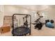 Basement is set up as a home gym with weight-lifting equipment and a trampoline at 3101 Goldeneye Pl, Superior, CO 80027