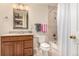 Full bathroom featuring a vanity with a sink, toilet, and bathtub with a shower at 3101 Goldeneye Pl, Superior, CO 80027