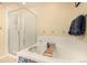Bathroom with a large bathtub, a shower, and decorative tiles at 3101 Goldeneye Pl, Superior, CO 80027