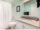 Clean bathroom features a vanity with a granite countertop and a shower with a curtain at 3101 Goldeneye Pl, Superior, CO 80027