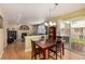 Open dining area with hardwood floors and sliding glass door to the outdoor patio at 3101 Goldeneye Pl, Superior, CO 80027