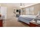 Spacious main bedroom with access to a walk-in closet, bathroom, and ample natural light at 3101 Goldeneye Pl, Superior, CO 80027