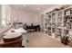 Office featuring a workspace, music instruments, and organized shelving for storage at 3101 Goldeneye Pl, Superior, CO 80027