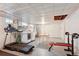 Basement with workout area, laundry appliances, and open layout at 8001 W 57Th Ave, Arvada, CO 80002