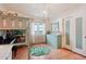 Charming bedroom featuring hardwood floors, a lofted bed, and ample storage space at 8001 W 57Th Ave, Arvada, CO 80002