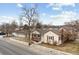 Charming single-Gathering home with a white picket fence and well-maintained front yard in a neighborhood setting at 8001 W 57Th Ave, Arvada, CO 80002