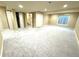 Spacious finished basement with neutral carpet and ample storage at 12743 W Bowles Pl, Littleton, CO 80127