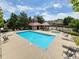 Community pool with seating area and well-maintained landscaping for a relaxing atmosphere at 12743 W Bowles Pl, Littleton, CO 80127