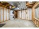 Unfinished basement space with washer/dryer hook ups ready to be customized at 1672 Maccullen Dr, Erie, CO 80516