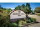 Arapahoe Ridge Park sign with lush landscaping and a blue sky backdrop at 1672 Maccullen Dr, Erie, CO 80516