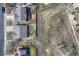 Aerial view showcasing home and large adjacent lot at 15119 E 119Th Ave, Commerce City, CO 80603