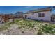 Large backyard with grassy area and a patio at 15119 E 119Th Ave, Commerce City, CO 80603