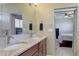 Double vanity bathroom with granite countertop at 15119 E 119Th Ave, Commerce City, CO 80603