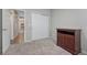 Bedroom with double door closet and view of kitchen at 15119 E 119Th Ave, Commerce City, CO 80603