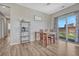 Kitchen dining area with sliding glass door to backyard at 15119 E 119Th Ave, Commerce City, CO 80603