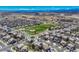 Aerial view of neighborhood with park and mountain views at 15119 E 119Th Ave, Commerce City, CO 80603