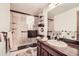 Well-maintained bathroom with a sleek glass shower and updated vanity at 3633 S Ingalls St, Denver, CO 80235