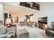 Comfortable living room with plush seating, TV and view of dining room at 3633 S Ingalls St, Denver, CO 80235