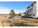 Sprawling backyard with a play area, green space, and patio, framed by a home exterior at 6367 Arapahoe Ct, Parker, CO 80134