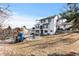 Home's exterior with backyard featuring a playset and a spacious yard at 6367 Arapahoe Ct, Parker, CO 80134