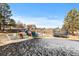 Backyard featuring playground equipment and a trampoline for outdoor fun at 6367 Arapahoe Ct, Parker, CO 80134