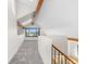 Bright loft area featuring a large window with great views, skylights, exposed beams, and neutral carpeting at 6367 Arapahoe Ct, Parker, CO 80134