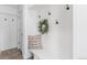 Cozy mudroom with built-in bench and coat hooks at 6367 Arapahoe Ct, Parker, CO 80134