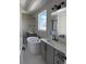 Bright bathroom features a soaking tub, double vanity with a granite countertop, and a large window at 898 Coal Bank Trl, Castle Rock, CO 80104