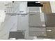 Selection of finishes showcasing tile, countertop, flooring, and backsplash options for a modern design at 898 Coal Bank Trl, Castle Rock, CO 80104