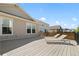 Large back deck with lounge chairs and modern railings provides relaxing outdoor living space at 4089 Forever Cir, Castle Rock, CO 80109