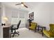 Office featuring a ceiling fan, dark wooden desk and shelving, with a printer at 4089 Forever Cir, Castle Rock, CO 80109