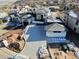New home construction with intricate driveway heating system and three car garage at 8132 Galileo Way, Littleton, CO 80125