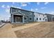 Charming two-story home featuring a covered front porch and inviting curb appeal at 1352 Orchard St, Brighton, CO 80601